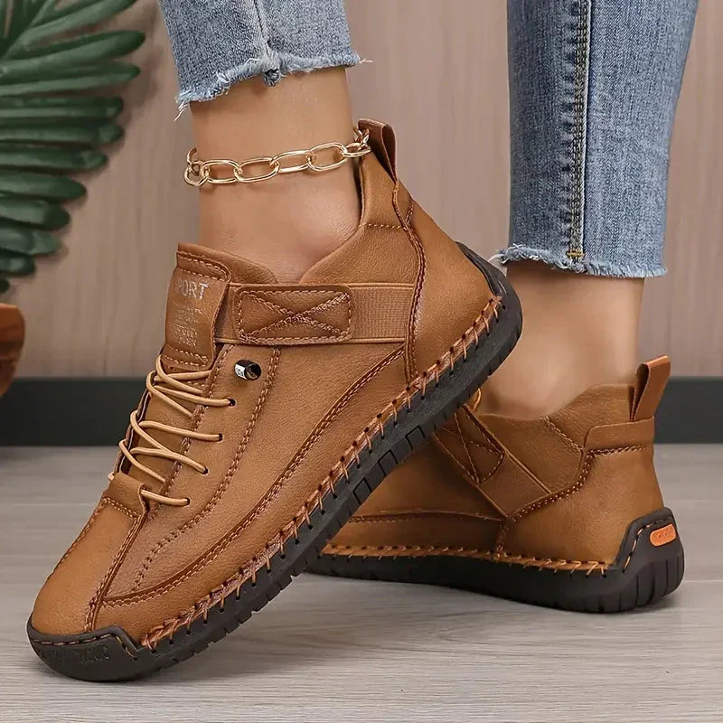 High top sneakers with laces, upper strap and contrast sole