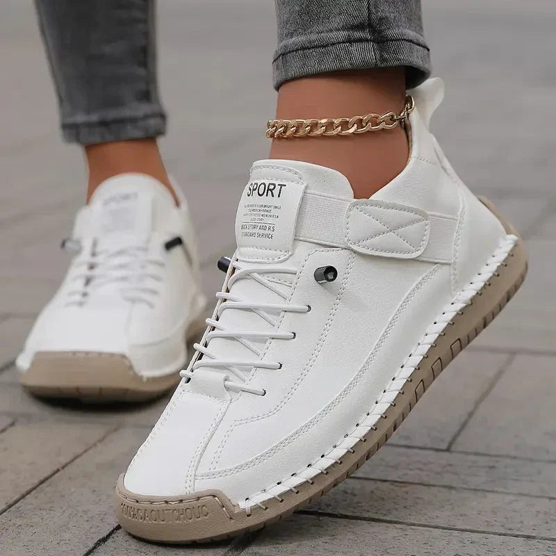 High top sneakers with laces, upper strap and contrast sole