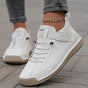 High top sneakers with laces, upper strap and contrast sole