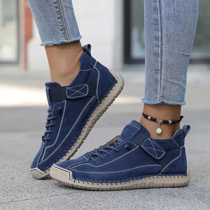 High top sneakers with laces, upper strap and contrast sole