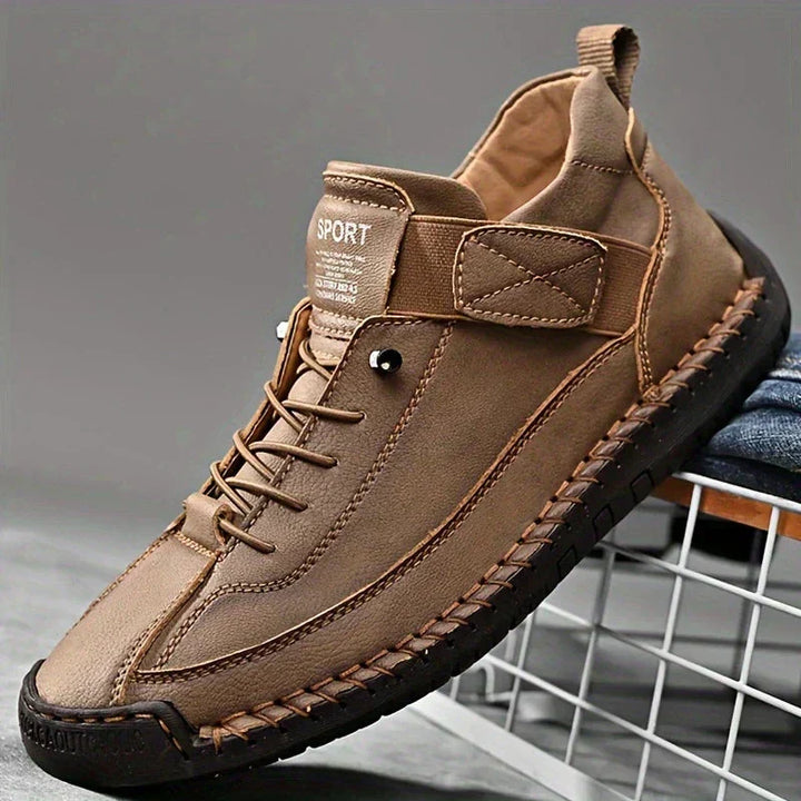 High top sneakers with laces, upper strap and contrast sole