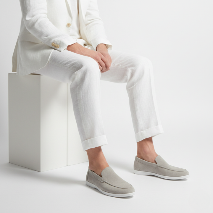Men's slip-on loafers with stitched detailing and contrast flat soles