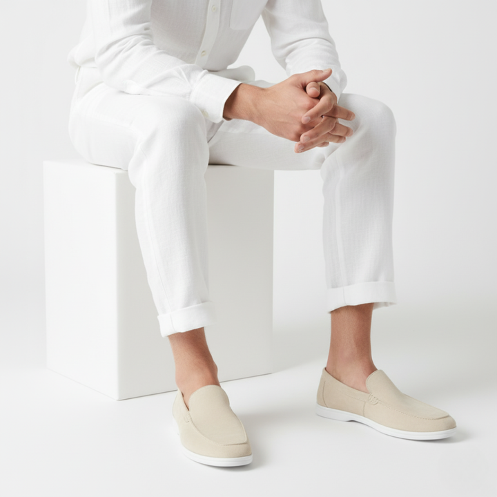 Men's slip-on loafers with stitched detailing and contrast flat soles