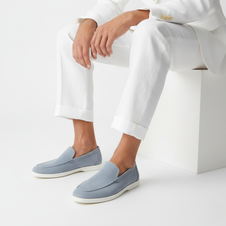 Men's slip-on loafers with stitched detailing and contrast flat soles