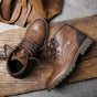Men's lace-up ankle boots with round toes, panelled uppers and lugged soles