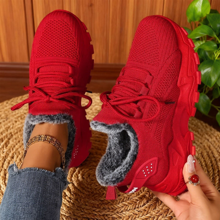 Lace-up trainers with textured uppers, deep tread soles and fleece-style lining