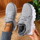 Lace-up trainers with textured uppers, deep tread soles and fleece-style lining