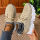 Lace-up trainers with textured uppers, deep tread soles and fleece-style lining