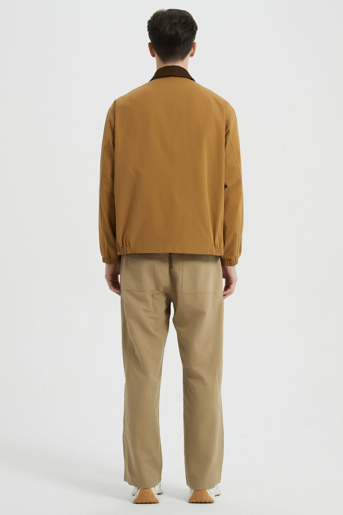 Men's collared windbreaker jacket with zip front and elasticated cuffs