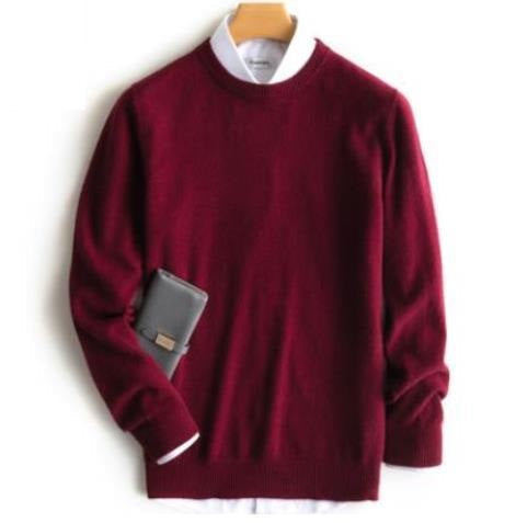 Solid crew neck sweater with long sleeves and ribbed trims layered over a collared shirt
