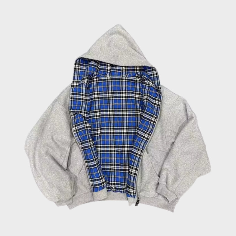 Reversible oversized hooded sweatshirt with plaid inner side and zip front
