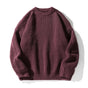 Ribbed knit sweater with crew neckline and long sleeves