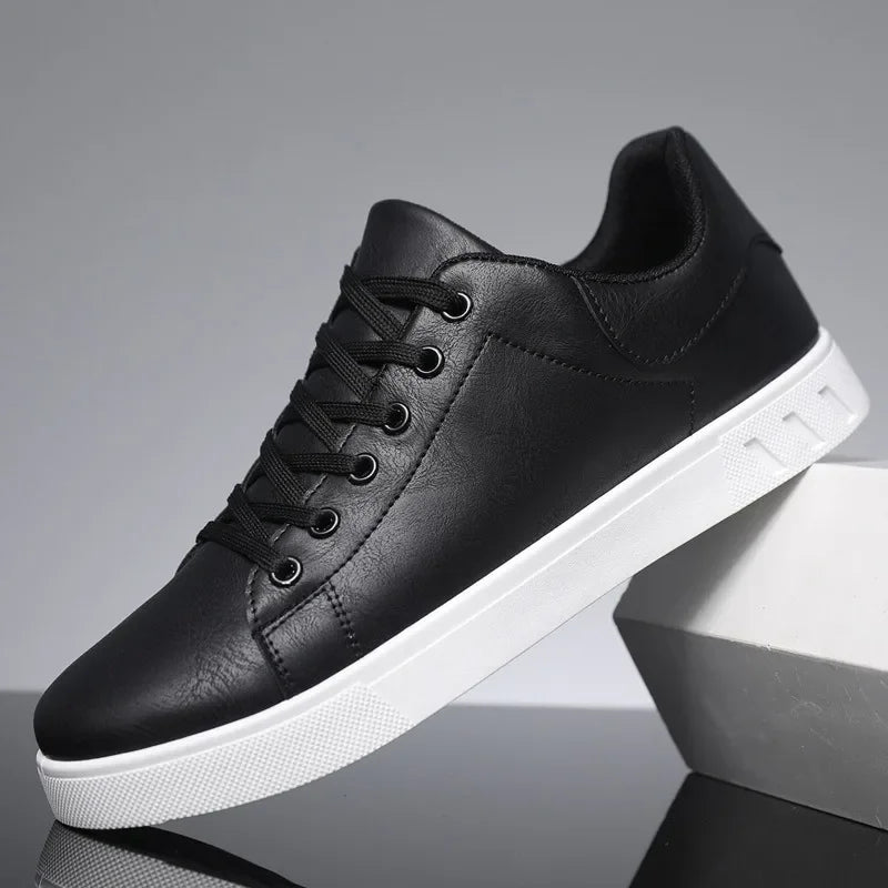 Men's low-top lace-up sneakers with round toe and flat white sole
