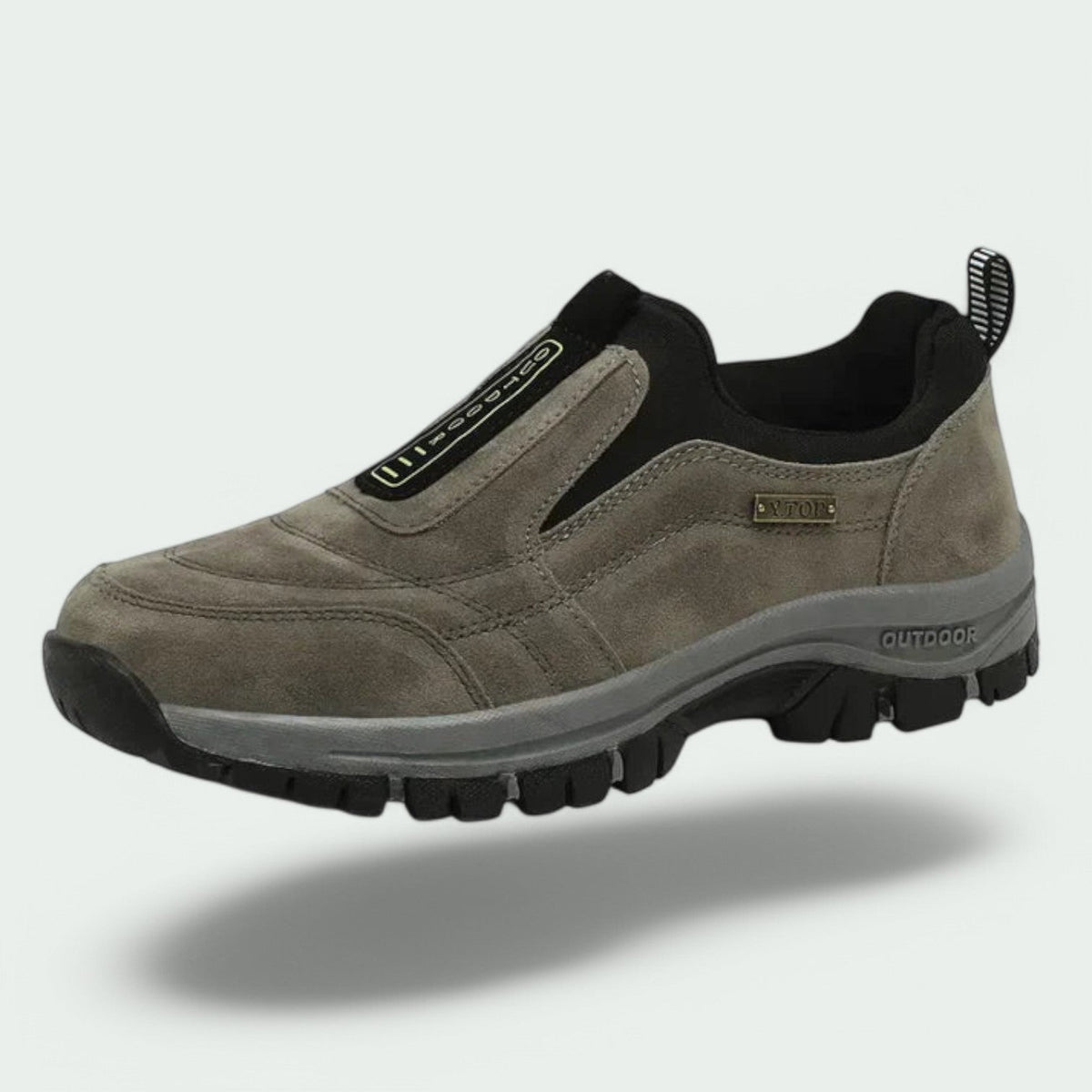 Unisex slip-on outdoor shoes with stitched panels, pull tab and chunky treaded sole