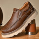 Slip-on moc toe loafers with contrast stitching and chunky lug soles