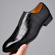 Glossy crocodile-effect embossed slip-on loafers