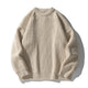 Ribbed knit sweater with crew neckline and long sleeves