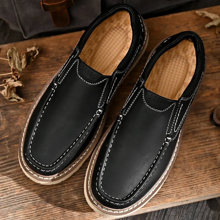 Slip-on moc toe loafers with contrast stitching and chunky lug soles