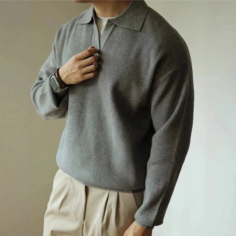Men's long sleeve textured knit polo shirt with a collared neckline