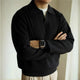 Men's long sleeve textured knit polo shirt with a collared neckline