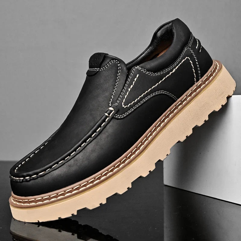 Slip-on moc toe loafers with contrast stitching and chunky lug soles