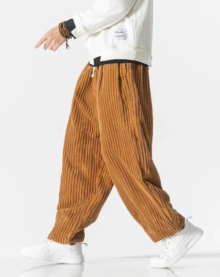 Wide-leg ribbed corduroy trousers with a drawstring waist