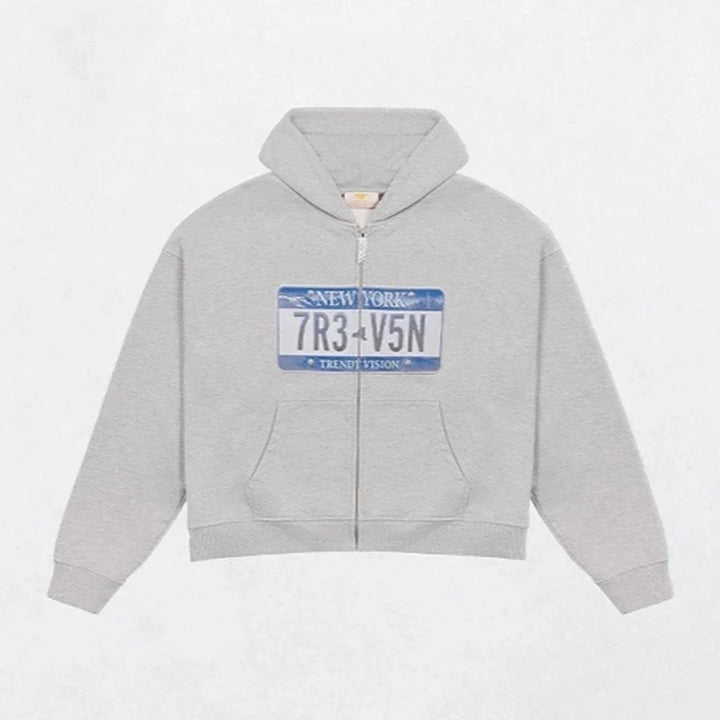 Cropped hooded zip hoodie with license plate chest graphic