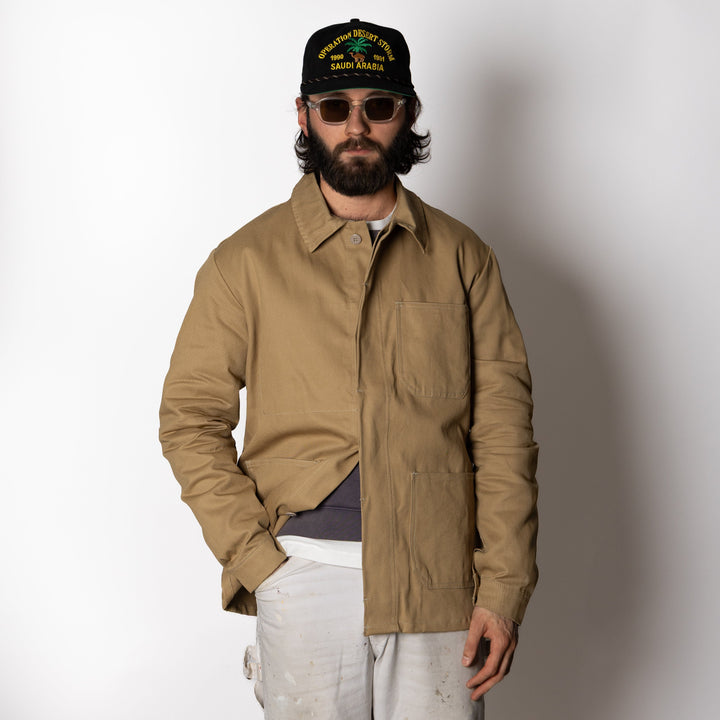 Men's brown utility jacket with shirt collar, button front and patch pockets