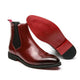 Men's Chelsea boots with square toes, elastic side panels and pull tabs shown in black and red