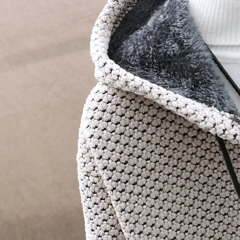 Textured knitted hooded jumper with zip front, drawstrings, long sleeves and front pockets