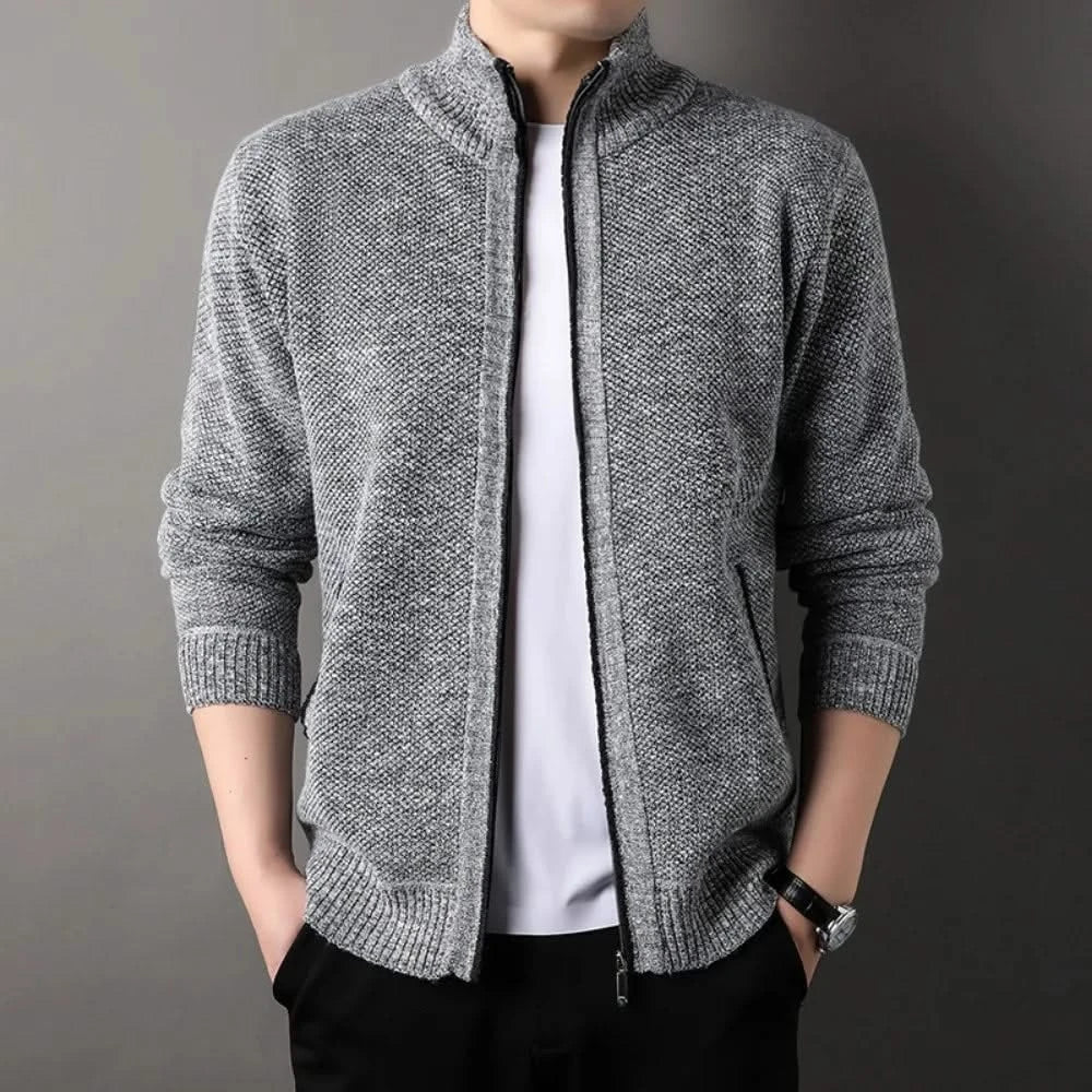 Men's textured knit jacket with high collar, zip front and ribbed trims
