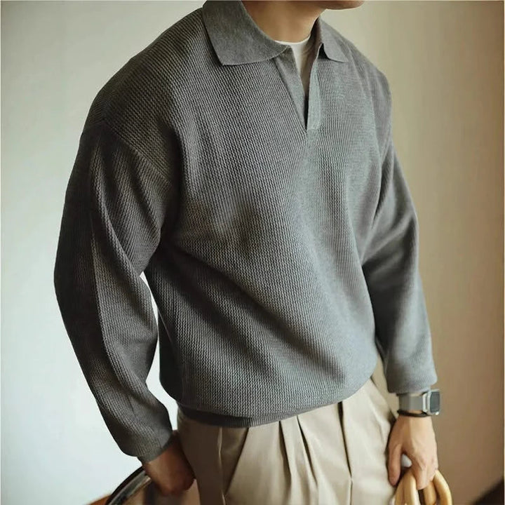 Men's long sleeve textured knit polo shirt with a collared neckline