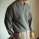 Men's long sleeve textured knit polo shirt with a collared neckline