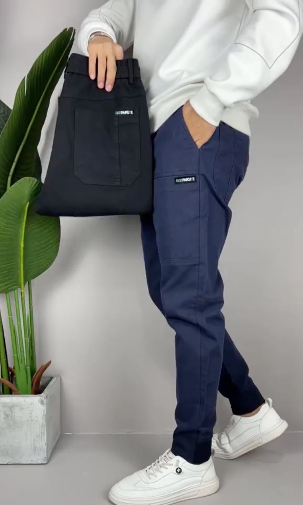 Unisex tapered cargo trousers with front, side and rear pockets