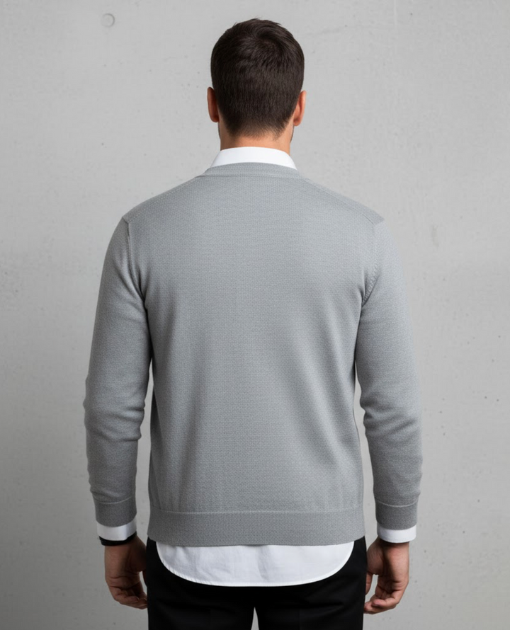Men's V-neck button cardigan layered over a shirt