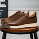Leather lace-up sneakers with textured side panels