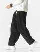 Wide-leg ribbed corduroy trousers with a drawstring waist