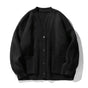 Ribbed knit cardigan with V-neck, buttons and two front pockets