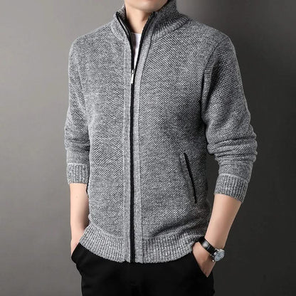 Men's textured knit jacket with high collar, zip front and ribbed trims