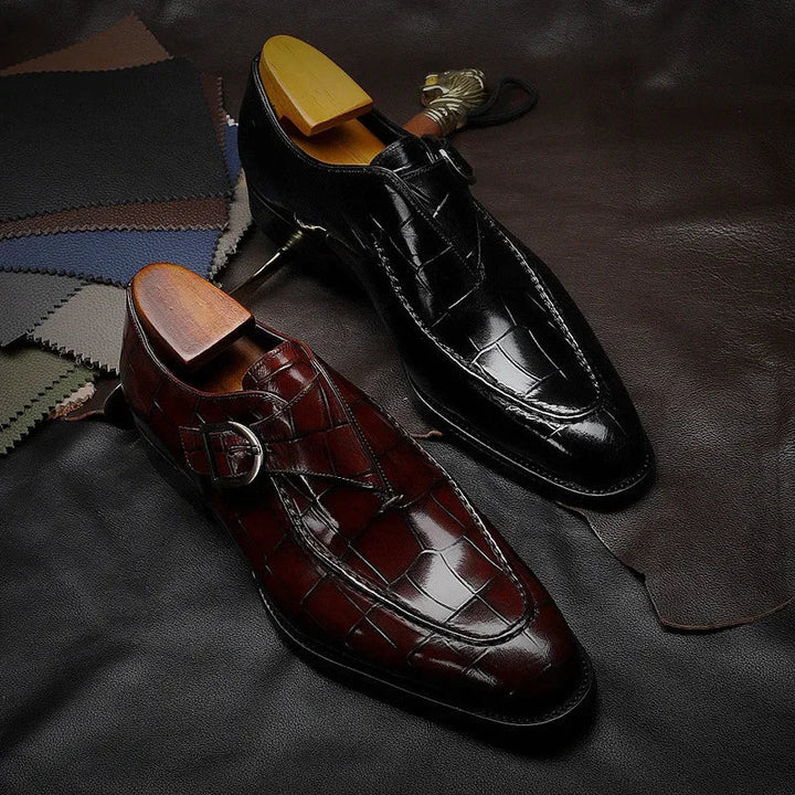 Crocodile pattern loafers with buckle straps and low heels
