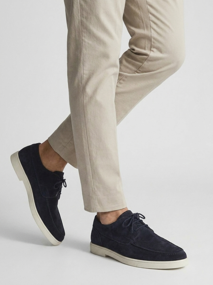 Men's lace-up loafers with moc-toe stitching and contrasting soles