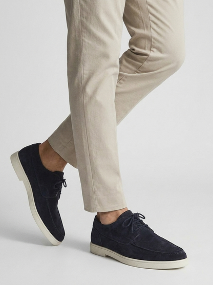 Men's lace-up loafers with moc-toe stitching and contrasting soles