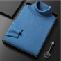 Solid ribbed turtleneck sweater folded in a presentation box