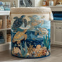 Quilted laundry basket with shell pattern and carry handles
