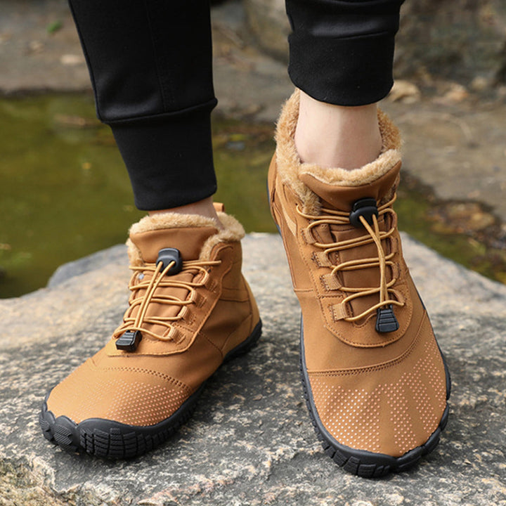 Textured winter barefoot ankle boots with lace-up toggle and padded trim