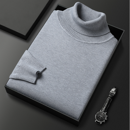 Solid ribbed turtleneck sweater folded in a presentation box