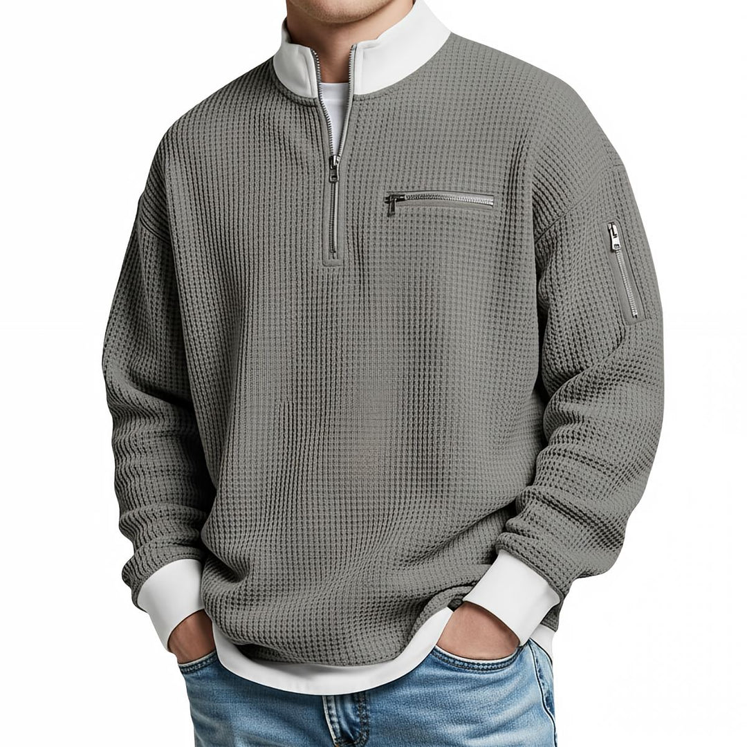 Men's textured half-zip jumper with stand collar and zipped pockets