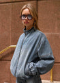 Mid-wash blue denim bomber jacket