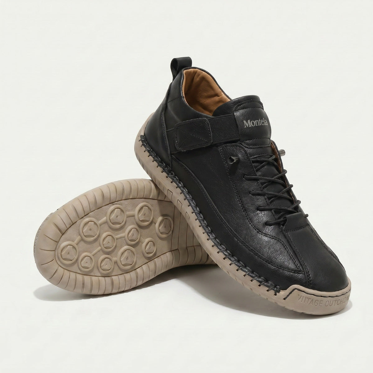 High-top lace-up sneakers with elastic ankle straps and textured flat soles