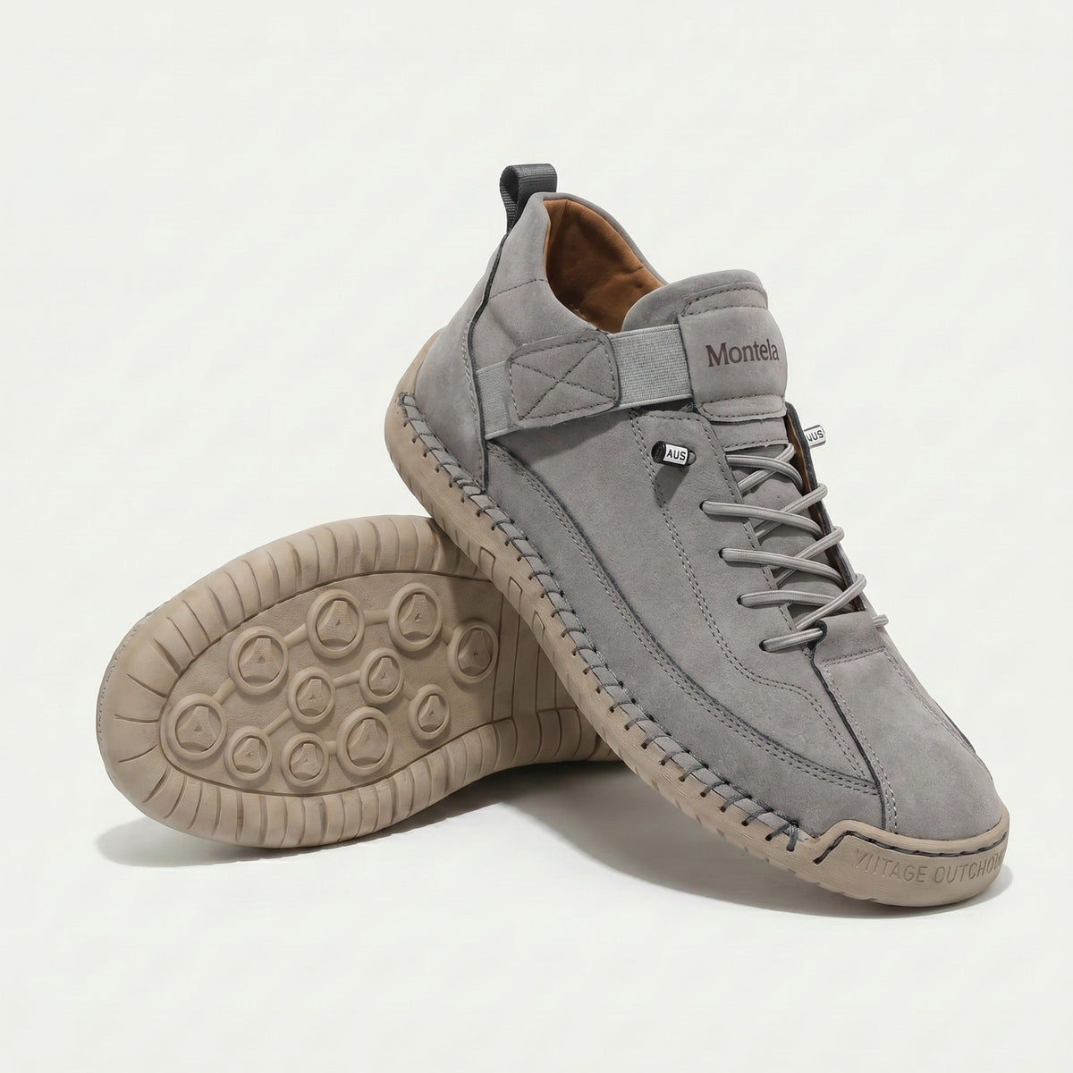 High-top lace-up sneakers with elastic ankle straps and textured flat soles